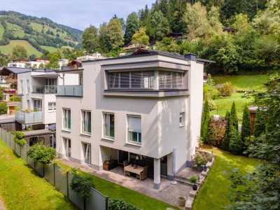 Elegante Maisonette-Wohnung mit Garten und sonnigen Terrassen