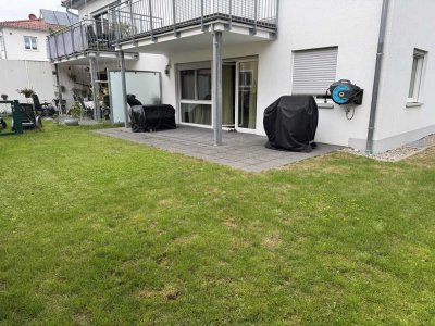 EG Wohnung mit Terrasse und Gartenanteil