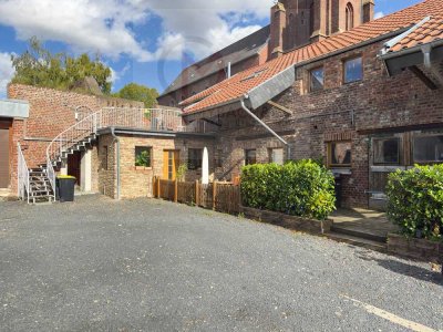 Sanierter Bauernhof mit 2 vermieteten Wohnungen – attraktive Kapitalanlage in Niederzier