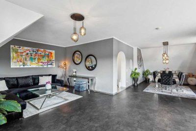 Engel & Völkers: Sanierte Eigentumswohnung mit Garten, Weitblick und 174 m² Wohnkomfort!