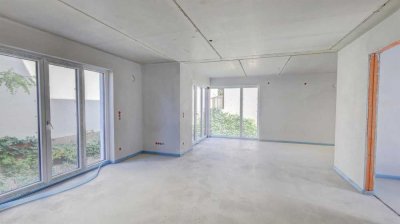 NEUBAU IN DACHAU: ERDGESCHOSSWOHNUNG MIT GARTEN, TERRASSE UND CARPORT