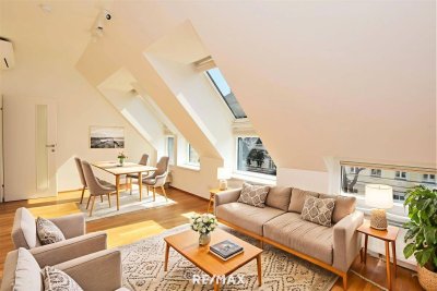Helle Dachgeschosswohnung mit Charme und viel Freifläche