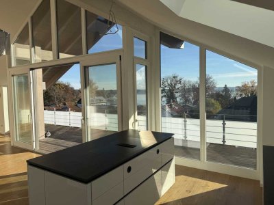 3-Zimmer Dachgeschosswohnung mit Seeblick im Zentrum