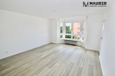 Frisch renovierte 3,5-Zimmer-Wohnung mit zwei Südbalkonen & Tiefgaragenstellplatz in zentraler Lage