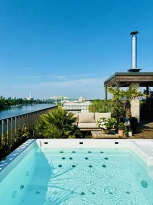 Einzigartiges Neubau Penthouse mit Dachterrasse, Skylineblick, Jacuzzi, Kamin direkt am Main!