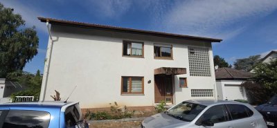 Grundstück mit kernsanierungsbedürftigem Haus und Baugenehmigung für Mehrfamilienhaus