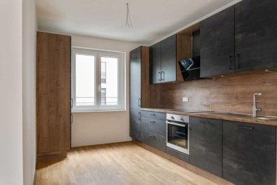 Moderne 3-Zimmer-Neubauwohnung mit Balkon, Aufzug & Tiefgarage