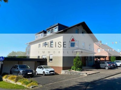 2-Zimmer-Souterrainwohnung mit EBK, Terrasse und PKW-Stellplatz, ruhige Wohnlage