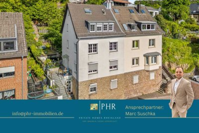 Einzigartige Maisonette-Wohnung mit Terrasse, privatem Garten und Kaminofen!