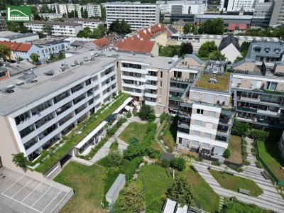 Grünblick mitten in der Stadt: 2-Zimmer-Neubauwohnung in Hofruhelage
