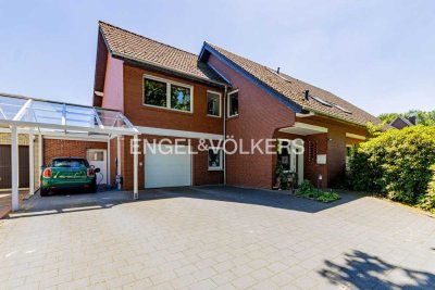 Moderner Wohntraum trifft Naturidylle – Zweifamilienhaus mit Gartenparadies und Wellnesscharakter