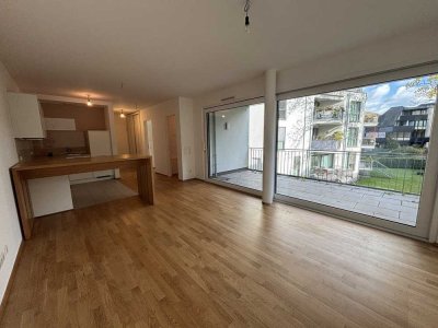 Hochwertige 2-Zimmer-Wohnung mit Balkon und TG-Stellplatz in unmittelbarer Rheinnähe
