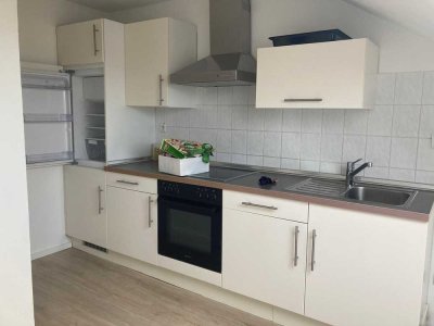 Helle Dachgeschosswohnung mit Stellplatz