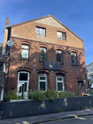 Vermietetes Haus als Kapitalanlage. Umfangreich saniert! 2 Wohnungen und eine Gewerbeeinheit