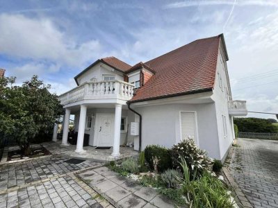 Erdgeschosswohnung mit Terrasse, Garten & 2 Stellplätzen in ruhiger Lage