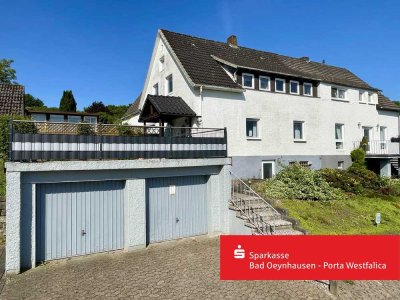 Zwei Wohneinheiten mit unverbaubarem Ausblick und großem Garten