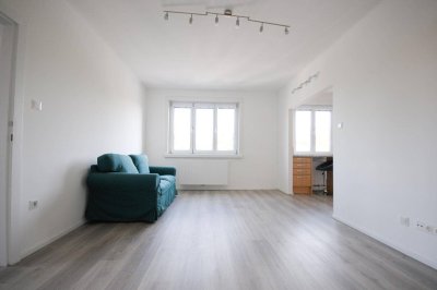 IDEALE 3,5 ZIMMER WOHNUNG - PERFEKTE RAUMAUFTEILUNG UND GEMEINSCHAFTSGARTEN