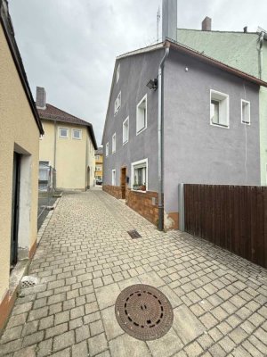 Solide vermietetes Einfamilienhaus im Herzen der Stadt – 5 Zimmer + Ausbaupotenzial