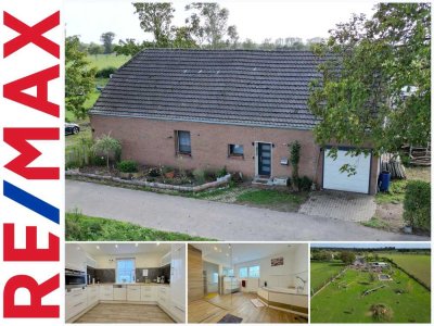 Einmalige Immobilie: Wohnen und Arbeiten auf großem Grundstück mit Grünland und Tierhaltung möglich!