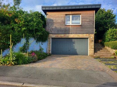 Einfamilienhaus mit Aussicht. Mit Sauna, Garage und Naturgarten. 1000qm Grundstück