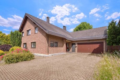 Elegantes Einfamilienhaus mit Einliegerwohnung und großzügigem Garten