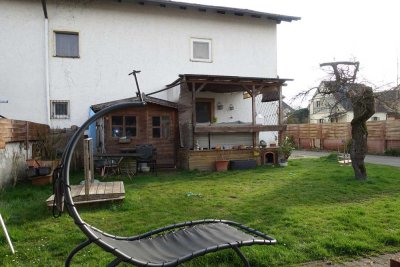 TÖGING: gepflegte DHH mit 2 Garagen, Büro/Gästebereich und großem Freisitz