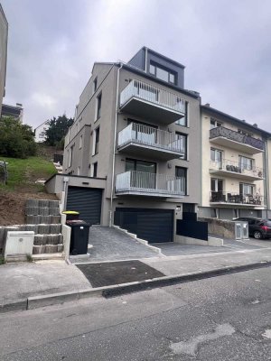 Erstbezug: Moderne 2-Zimmer-Neubauwohnung mit Terrasse und seitlichem Rheintalblick