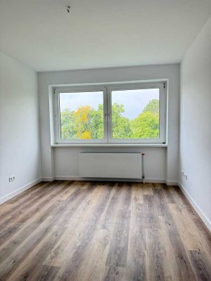Erstbezug nach Sanierung - 4 Zimmer Wohnung mit Gäste WC, Balkon und Gemeinschaftsgarten