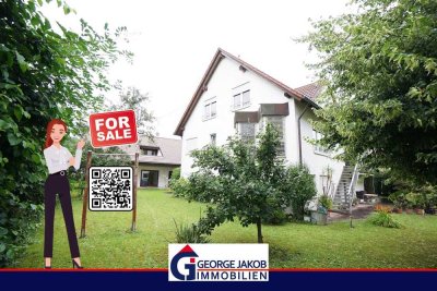 GEORGE JAKOB IMMOBILIEN: Charmantes Einfamilienhaus mit grüner Oase!