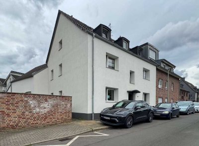 Vermietete Dachgeschosswohnung im modernisierten Mehrfamilienhaus