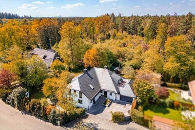 Stilvolles Familiendomizil mit idyllischem Garten und Anliegerwohnung in bester Gräfelfinger Lage