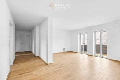 Barrierefrei: Stilvolle Neubauwohnung mit Aufzug und Balkon in ruhiger Lage