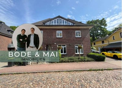 REINBEK - Lichterfüllte Maisonette-Wohnung im Dachgeschoss mit Balkon und zwei TG-Stellplätzen