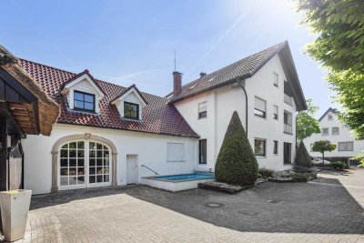 Flexibles MFH mit Gewerbe, Pool & Sauna auf 1.435 m² Grundstück