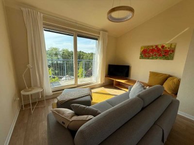 Möblierte, lichtdurchflutete 2-Zi. Dachgeschosswohnung mit 2 Terrassen, Lift & Tiefgarage