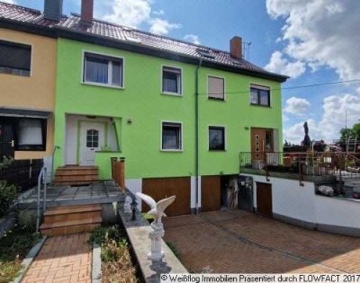 Reihenmittelhaus mit Terrasse, Garten und Garage