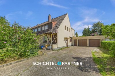 Lehe | Gepflegte Doppelhaushälfte mit 2 Wohneinheiten, Garten & Garagen