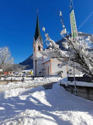 Winter in den Tiroler Alpen - Investoren aufgepasst: Penthouse im Landhaus Erstbezug