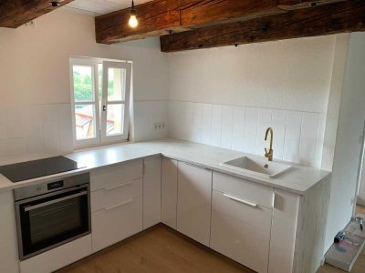 Charmante 2-Zimmer-Altbauwohnung in zentraler und grüner Lage