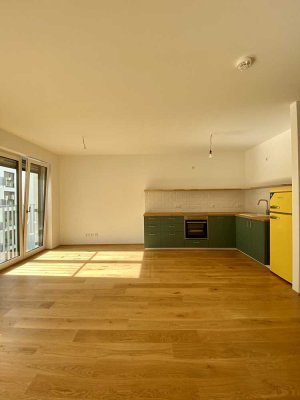 Helle 4-Zimmer-Neubauwohnung mit Balkon - KfW55 -WG geeignet