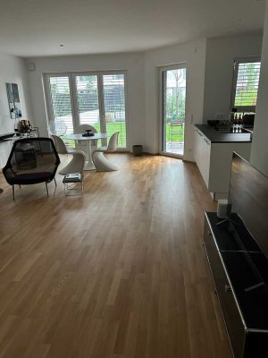 Moderne Wohnung mit Garten in bester Lage