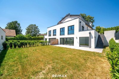 Erstbezug: Großzügiger Familientraum mit unverbaubarem Grünblick!