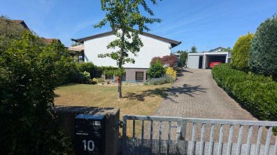 Einfamilienhaus mit Einliegerwohnung und großem Garten in ruhiger Lage