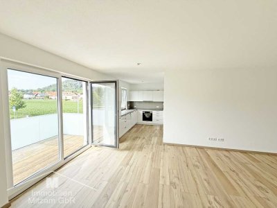 Perfekter Ausblick: Neuwertige 2-Zimmer-OG-Whg. mit EBK, Aufzug u. TG-Stellplatz in 1A-Lage