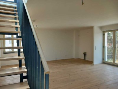 Lichtdurchflutete 2,5-Zimmer-Wohnung im 5. OG mit Dachterrasse, Tiefgarage & SPA-Bereich