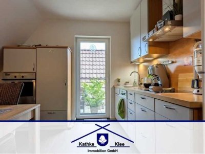 Moderne Obergeschosswohnung mit lichtdurchfluteten Räumen und Dachterrasse in Ottersberg