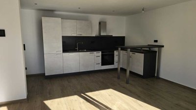 Neubau 2-Zimmer-Souterrain-Wohnung mit geh. Innenausstattung mit EBK und Terrasse in Grötzingen
