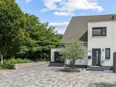 Modernes Wohnen in familienfreundlicher Lage: Doppelhaushälfte mit Weitblick in Baesweiler-Setterich