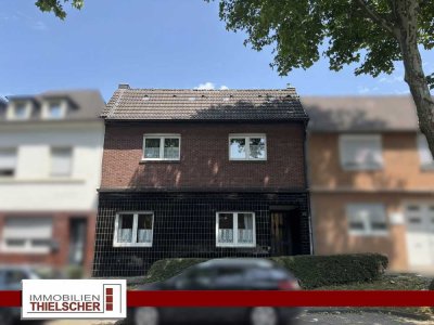 Vielseitiges Einfamilienhaus mit großem Garten, Garage – Ideal für Mehrgenerationen oder Handwerker