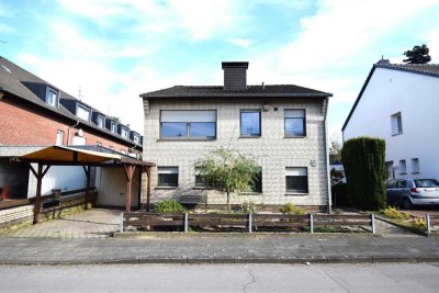 Freistehendes Einfamilienhaus mit Garage und großem Garten